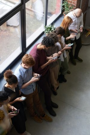 people on their smartphones