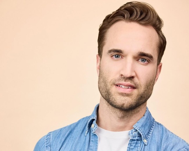 Image of Eric Feltes 4 over 5 in a professional headshot